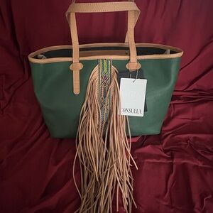 Brand new never been used Consuela Green and Tan Fringe Tote Bag